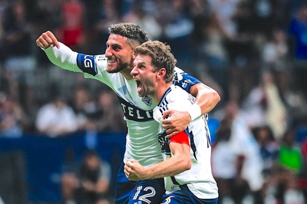 Vancouver Whitecaps FC players Thomas Müller, right, and Belal Halbouni celebrate at BC Place Stadium during a game on Saturday, Aug. 23, 2025. (Contributed/Whitecaps FC)