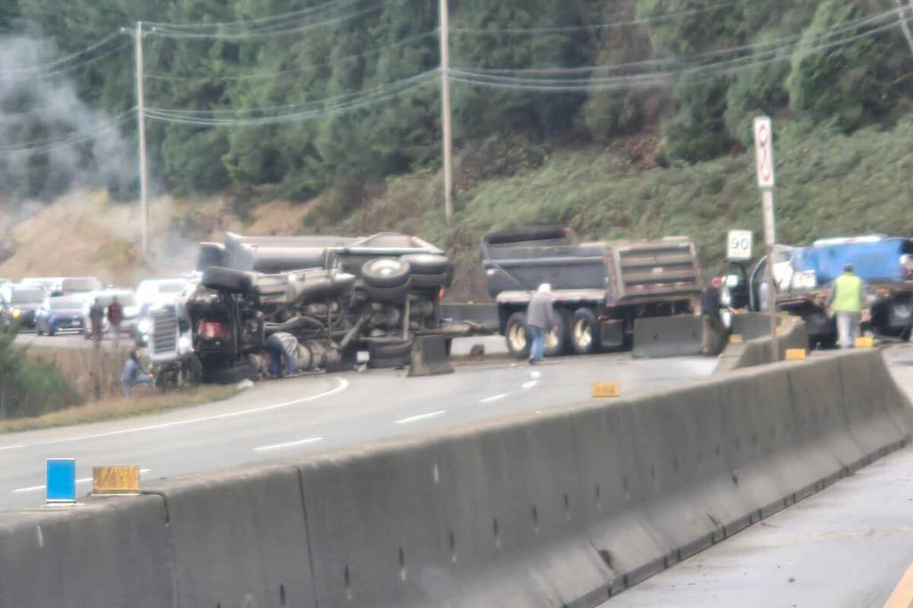 A dump truck crashed through the concrete median of Highway 19 in Nanoose Bay on Jan. 6. (Daryl Richardson/Facebook photo)