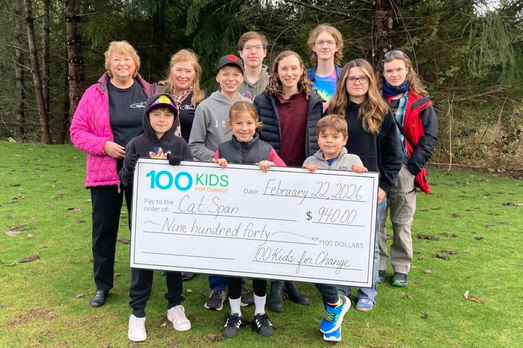 100 Kids for Change Oceanside presents their February 2026 donation of $940 to representatives from CatSpan Ferals Registered Charity. (Peter van Dongen photo)